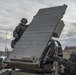 Marines from Headquarters Battery, 14th Marines set up an AN/TPQ-46 Fire-Finder