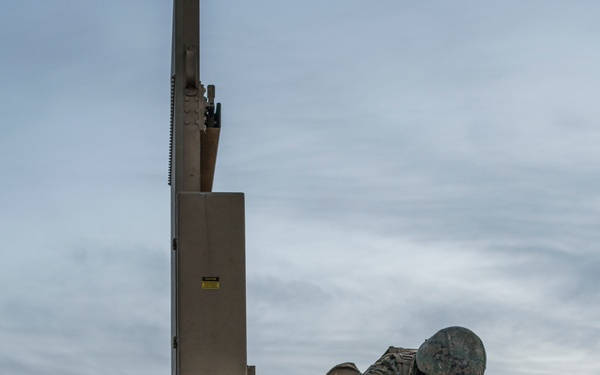 Marines from Headquarters Battery, 14th Marines set up an AN/TPQ-46 Fire-Finder