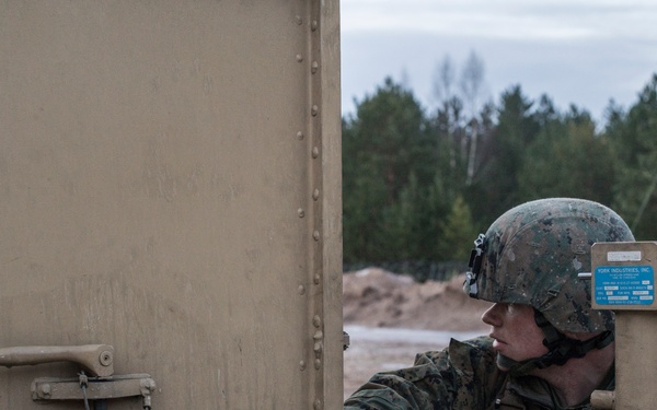 Marines from Headquarters Battery, 14th Marines set up an AN/TPQ-46 Fire-Finder