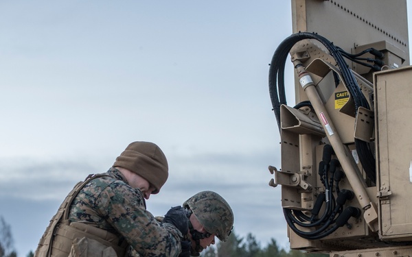 Marines from Headquarters Battery, 14th Marines set up an AN/TPQ-46 Fire-Finder