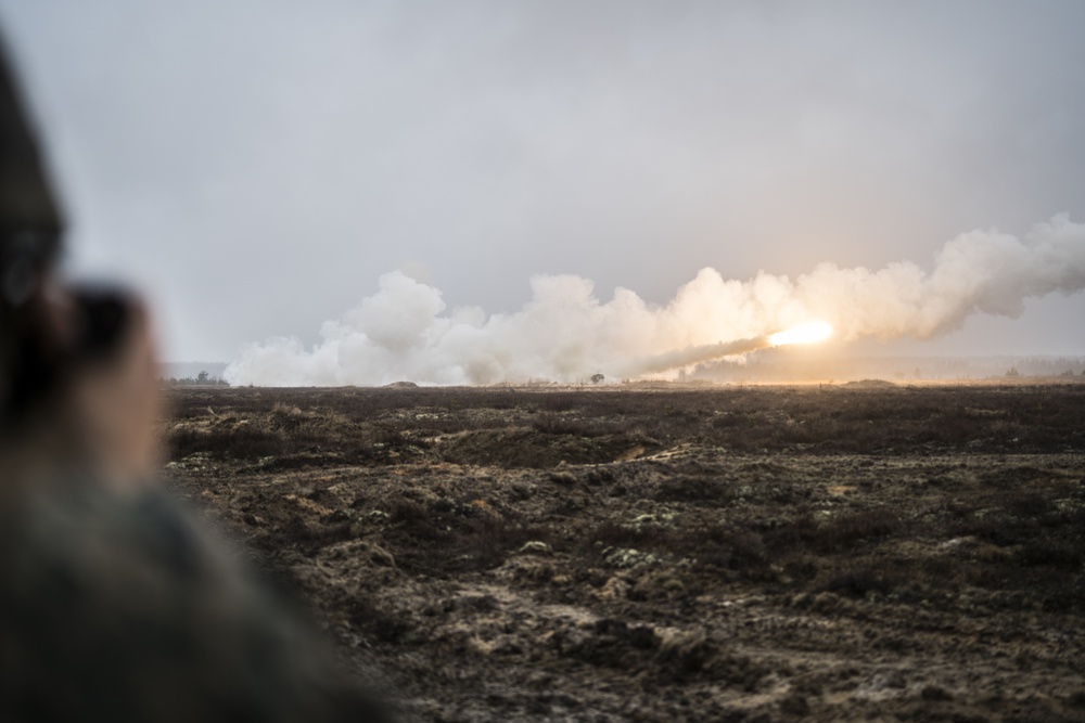 Latvia Army COMCAM and U.S. Marine COMMSTRAT photograph HIMARS shoot