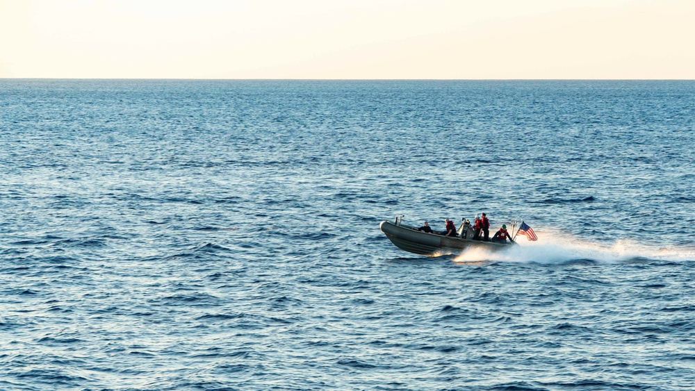 U.S. Sailors conduct small boat training on a rigid-hull inflatable boat
