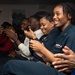 U.S. Sailors applaud during a lip-sync competition