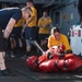 U.S. Sailors participate in an Oleoresin Capsicum (OC spray) training course