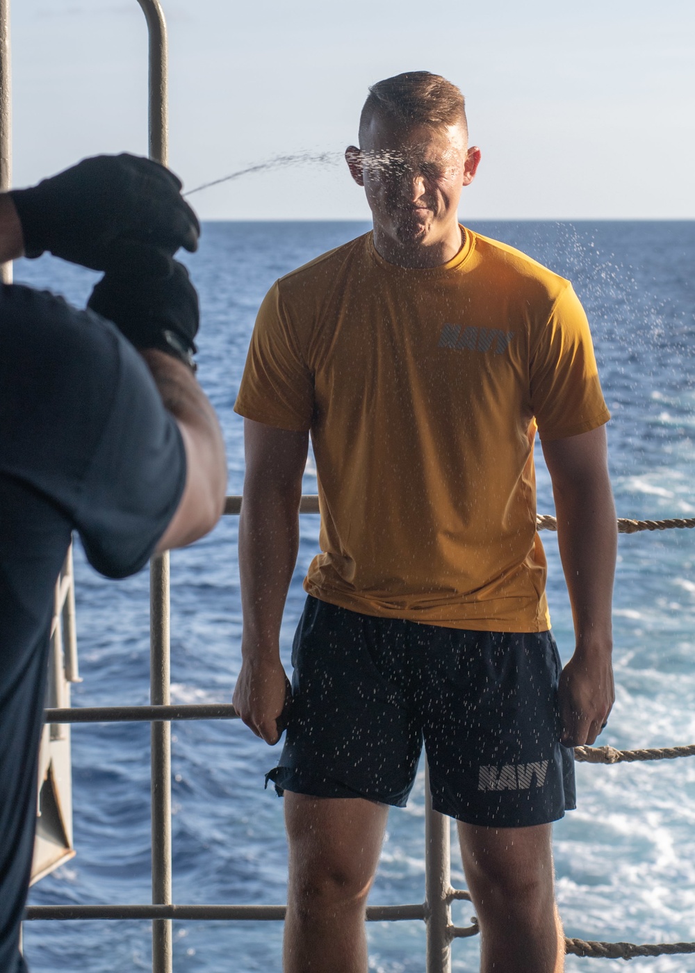 U.S. Sailors participate in an Oleoresin Capsicum (OC spray) training course