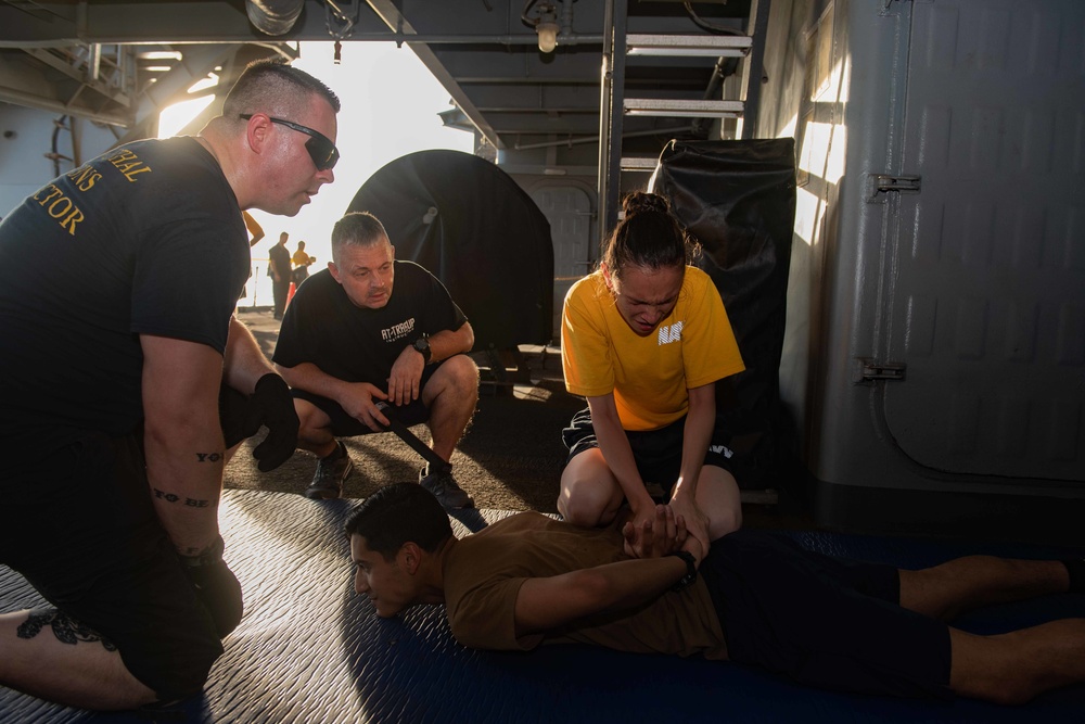 U.S. Sailor participates in Oleoresin Capsicum (OC) spray training course