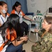 Cmdr. Abigail White Demonstrates Defibrillator to Philippine Healthcare Professionals during Pacific Partnership 2019