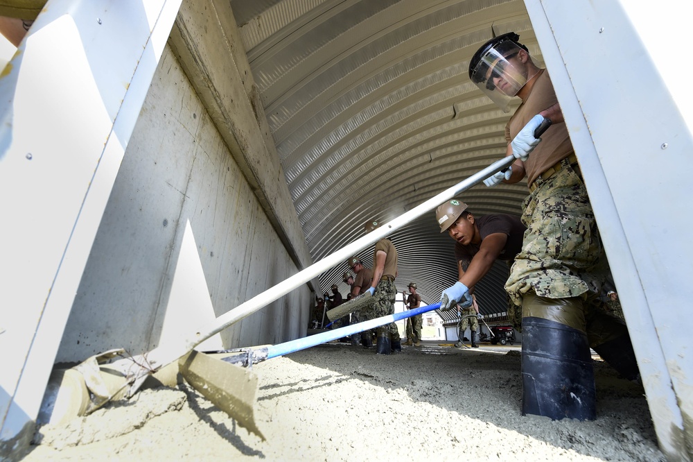 Seabees Place Concrete for K-Span Construction