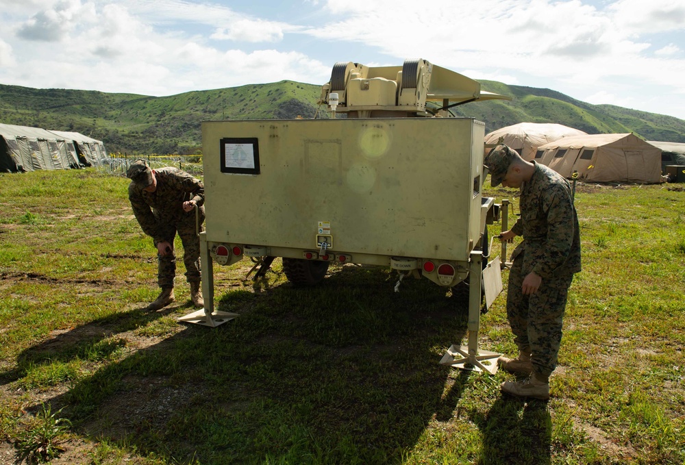 Marines from CLR 1 set up a VSAT during Pacific Blitz 2019