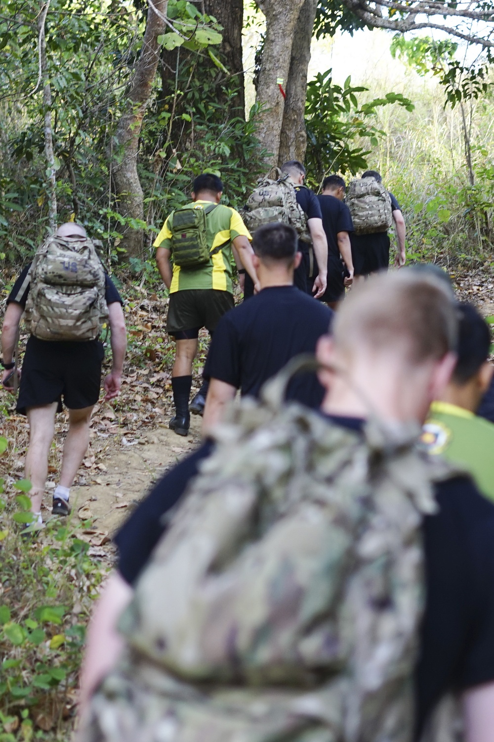 U.S., Filipino soldiers hike the hills of the Philippines