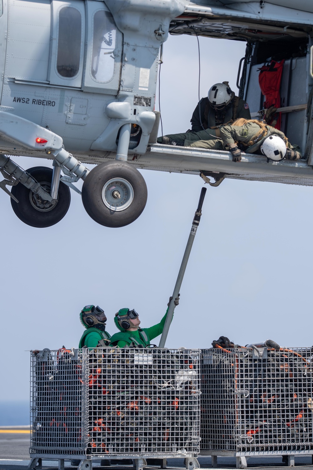 The aircraft carrier USS John C. Stennis (CVN 74) conducts a vertical replenishment