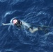 U.S. Navy Sailors recover a simulated man overboard during a man overboard drill aboard USS Spruance.