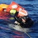 U.S. Navy Sailors recover a simulated man overboard during a man overboard drill aboard USS Spruance.