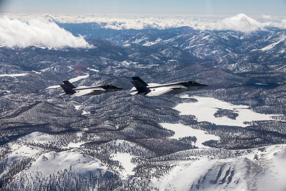 F-35C Fly Over Snow Covered Sierra Mountains