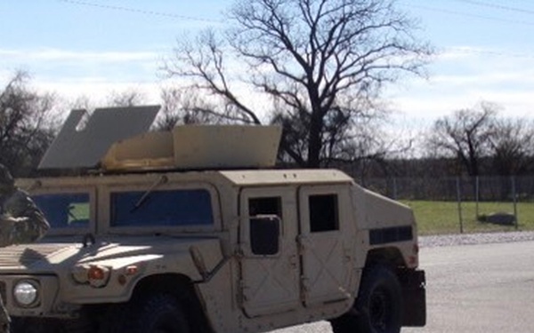 2-381 TRANS BN Instructor Shows Soldiers Ground Guiding Procedures