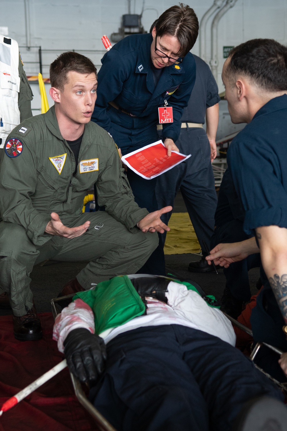 U.S. Sailors participate in a mass casualty drill