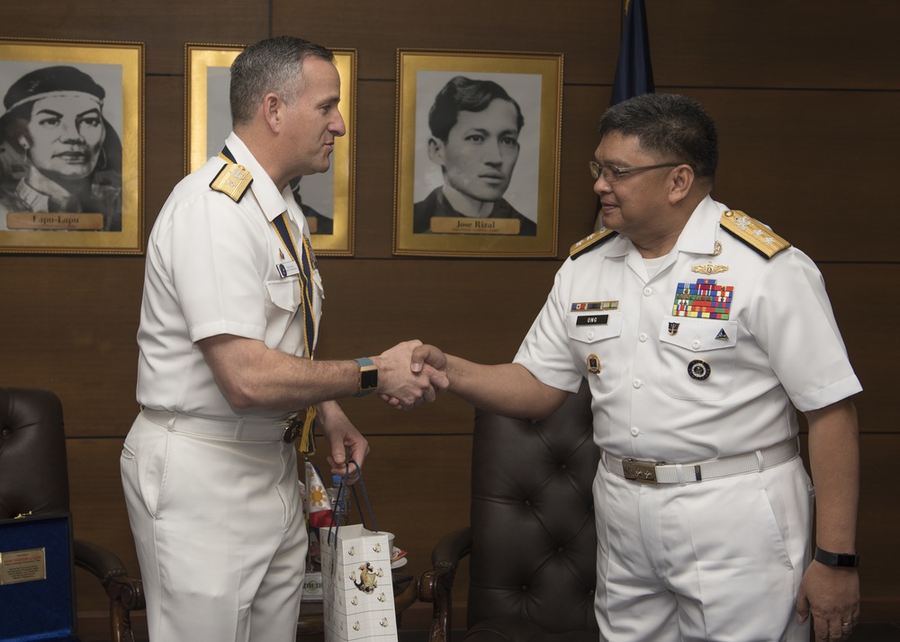 Rear Admiral Theodore LeClair, deputy commander, U.S. 7th Fleet, meets with, Rear Adm. Rommel Jude G. Ong, vice commander of the Philippine Navy