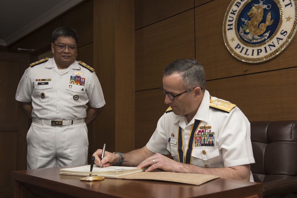 Rear Admiral Theodore LeClair, deputy commander, U.S. 7th Fleet, meets with, Rear Adm. Rommel Jude G. Ong, vice commander of the Philippine Navy