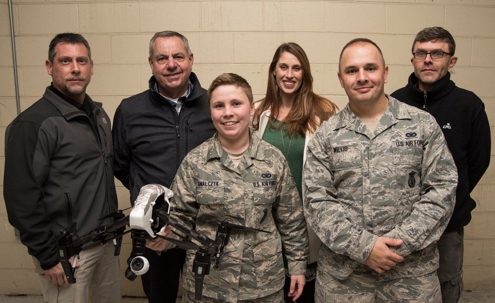 JBA security personnel lean forward to address small unmanned aerial systems