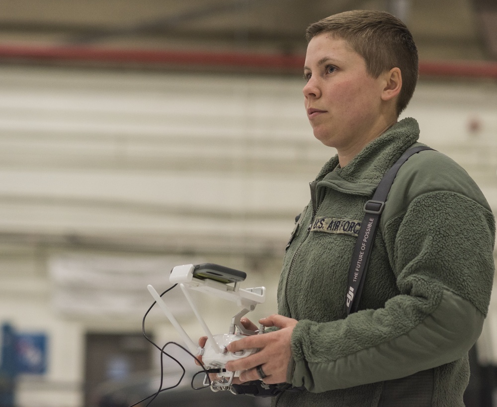 JBA security personnel lean forward to address small unmanned aerial systems