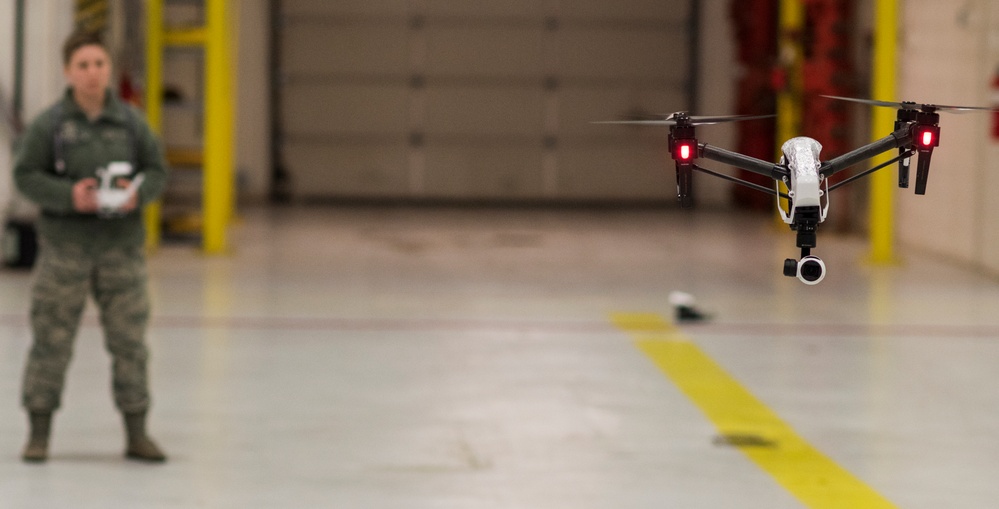 JBA security personnel lean forward to address small unmanned aerial systems