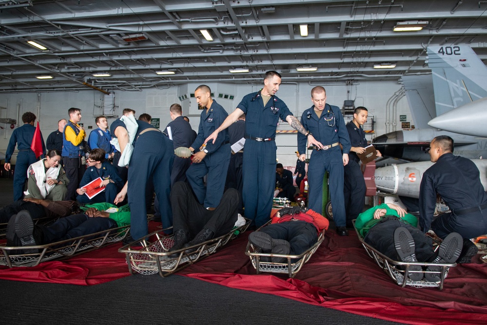 The aircraft carrier USS John C. Stennis (CVN 74) conducts a mass casualty drill