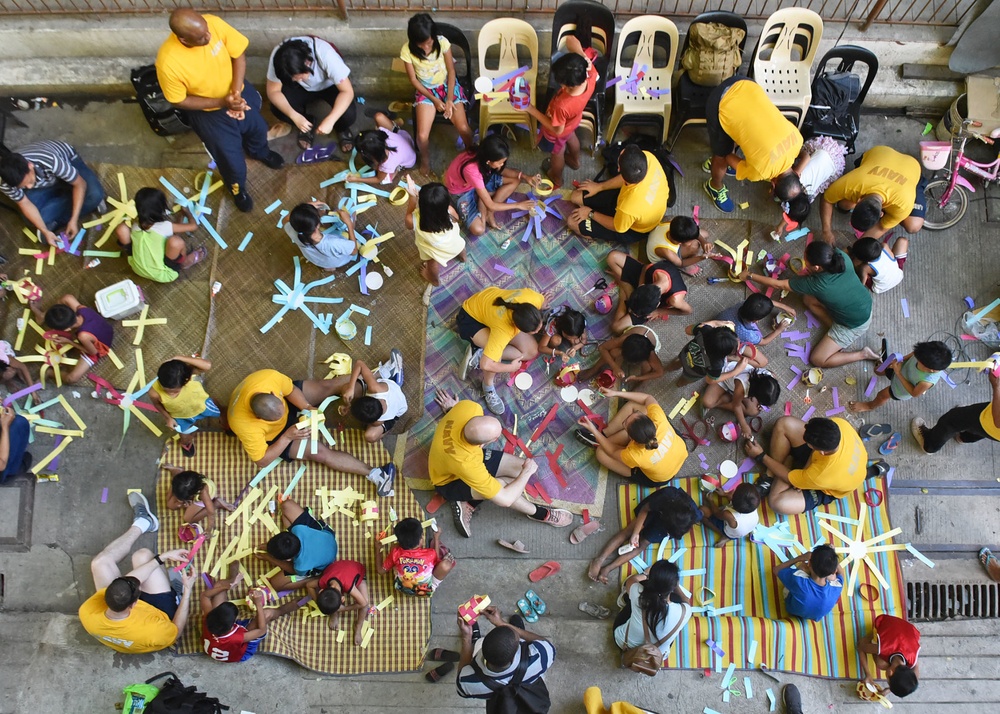 C7F/Blue Ridge Sailors participate in a community relations event at Gawad Kalinga Munting Pamayanan