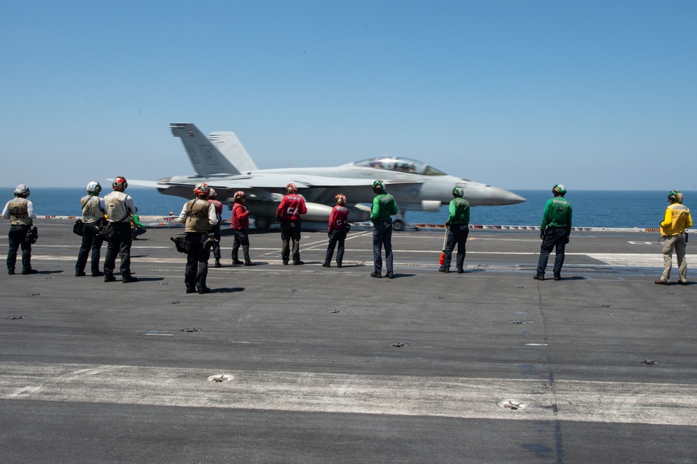 U.S. Sailors observe flight operations