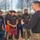 Marines teach leadership during a wake up and work out