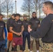 Marines teach leadership during a wake up and work out