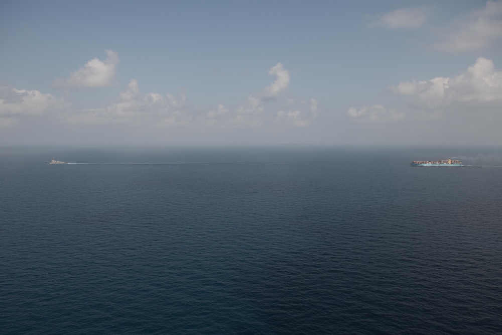 Chung-Hoon, HSM-37, and a merchant ship participate in Lucky Mariner 19