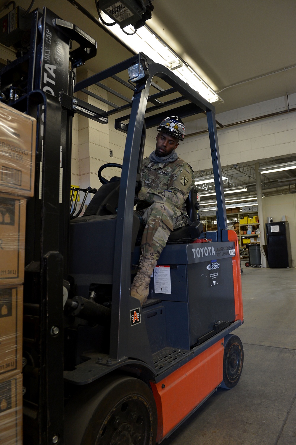 Nebraska Army National Guard Load Pallets of Water For Relief in Nebraska Floods