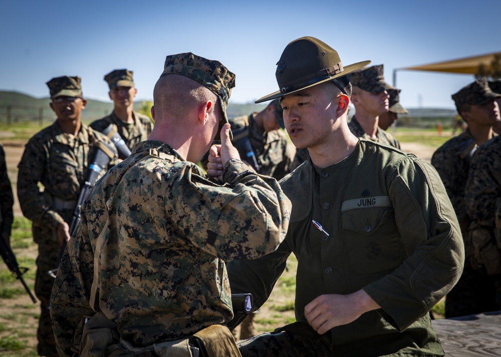 Edson Range PMI’s conduct rifle inspections during grass week