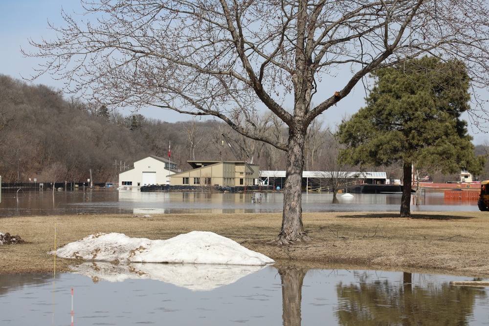 Water surrinds building in north Omaha