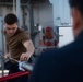 Sailors Perform Maintenance Aboard USS Harpers Ferry