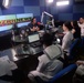 Members of the U.S. 7th Fleet Band conduct an interview during an appearance at DZRH News/TV and Radio in Manila, Philippines