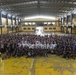 Members of the U.S. 7th Fleet Band pose for a photo with students from the Tuloy Foundation