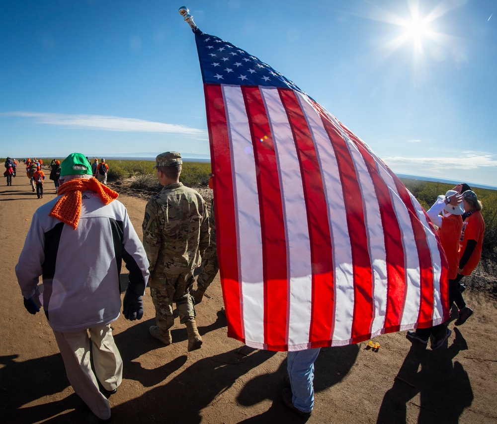 Skardon walks w American flag