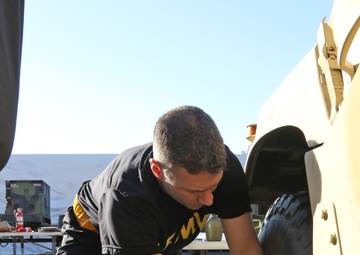 How many company commanders does it take to change a tire?