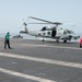 An MH-60R Sea Hawk lands on the flight deck