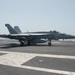 An F/A-18E Super Hornet lands on the flight deck