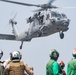 An MH-60S Sea Hawk, assigned to Helicopter Sea Combat Squadron (HSC) 14, prepares to land on the flight deck