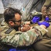 Paratrooper checks respirations