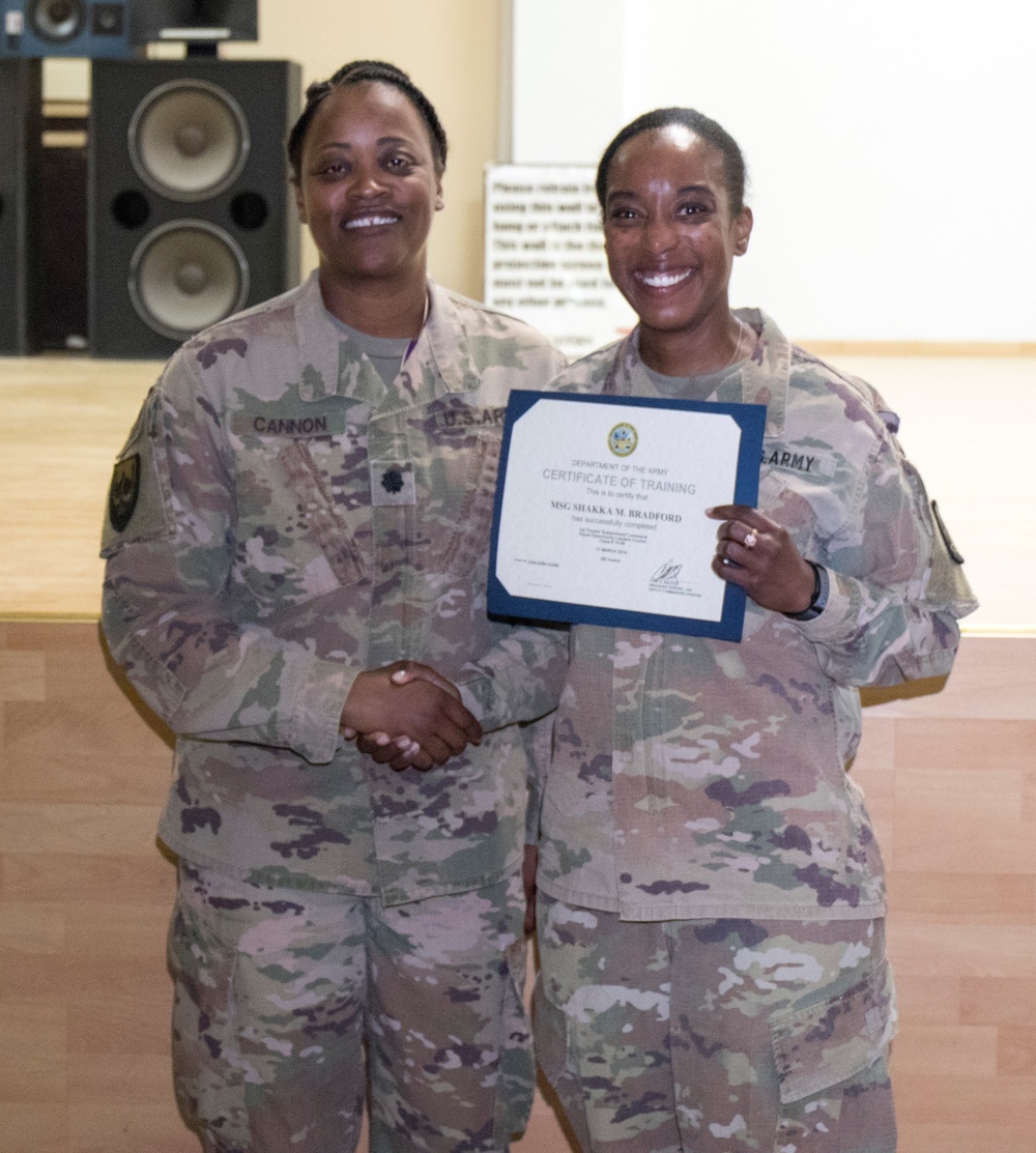 Signal Soldier graduates Equal Opportunity Leaders Course 19-06 at Camp Arifjan, Kuwait