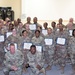 Signal Soldier graduates Equal Opportunity Leaders Course 19-06 at Camp Arifjan, Kuwait