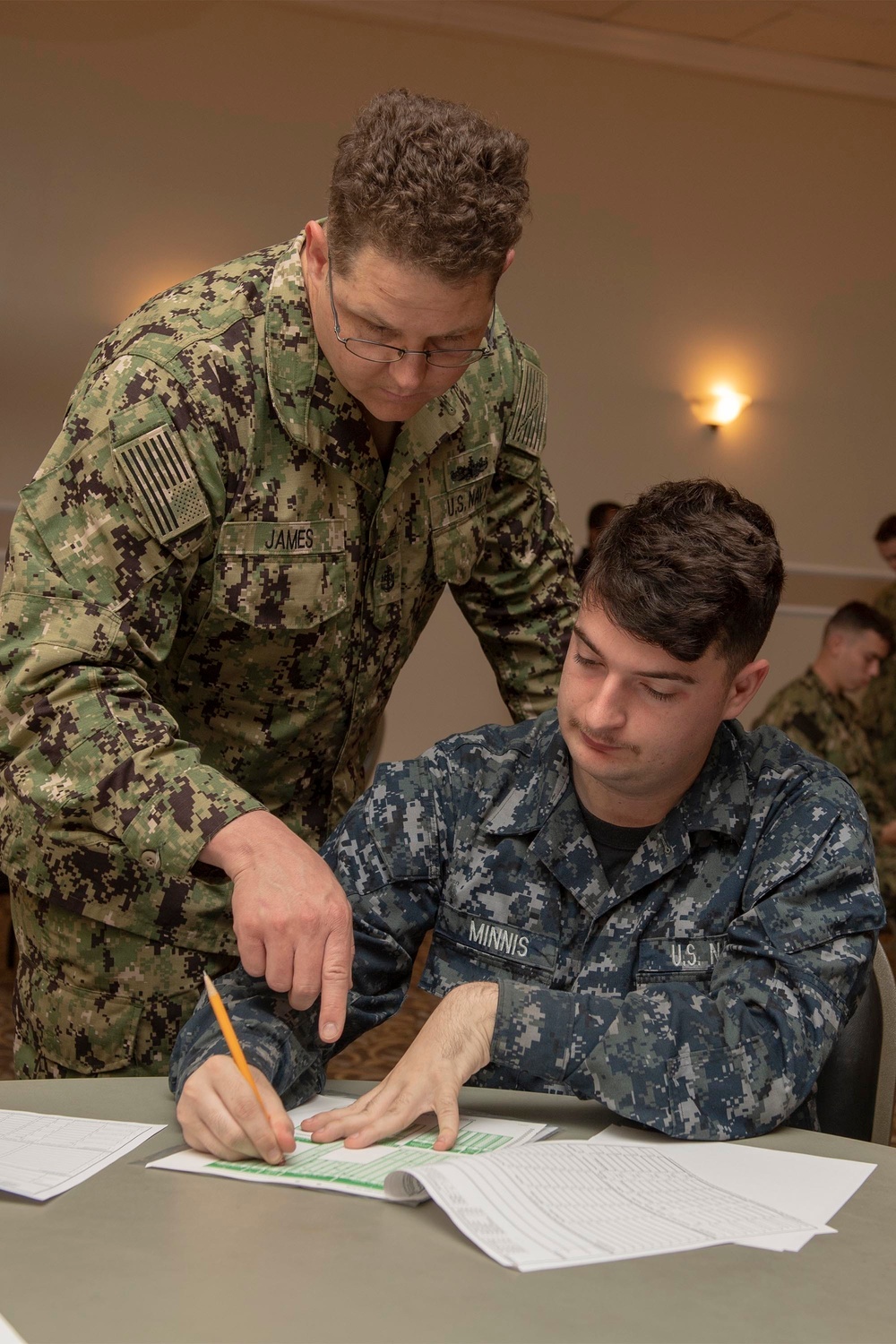 USS Bonhomme Richard Sailors participate in the Navywide E-4 advancement exam