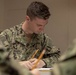 USS Bonhomme Richard Sailors participate in the Navywide E-4 advancement exam