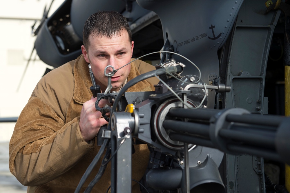 Alaska Air National Guardsmen prepare for aerial gunnery training at JBER