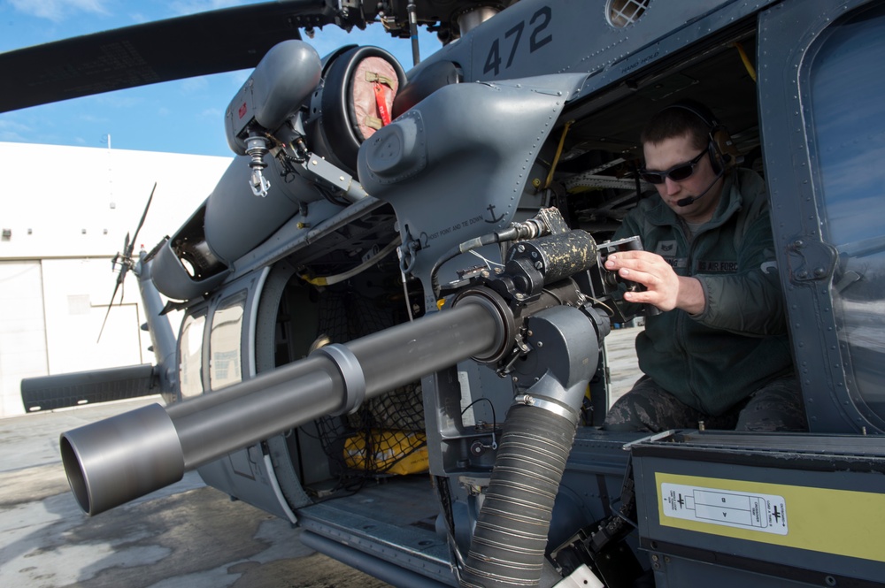 Alaska Air National Guardsmen prepare for aerial gunnery training at JBER