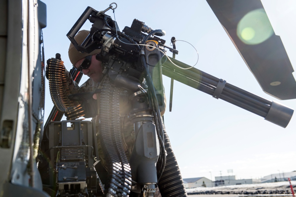 Alaska Air National Guardsmen prepare for aerial gunnery training at JBER